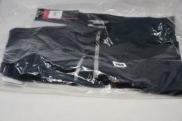 An as new Zero Restriction Z500 quarter zip golf top (S).