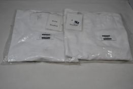 Two women's as new Acne Studios Cylea Emboss T-shirts in optic white (Both XS - RRP £78 each).