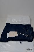A pair of as new iBlues Pucci jeans (UK 10).