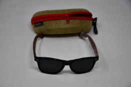 Five pairs of as new Woodies sunglasses.