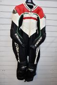 A pre-owned Dainese motorcycle racing suit (Size 58).