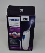 A Philips Sonicare Interdental cleaning device in white.