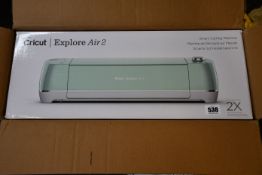 A boxed as new Cricut Explore Air 2 Smart Cutting Machine in mint.