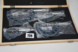 A boxed as new 4-piece micrometer set (0-100x0.01mm).