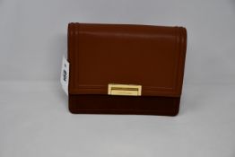 An as new By Marlene Birger Amber mini shoulder bag (RRP €167).