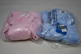 Six children's as new Satila Malva hats in light blue (45) and pink (49).