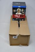 Three boxed as new Complete True Blood Series on Blu-ray.