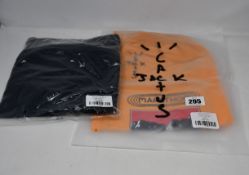 A pair of Cactus Jack Path shorts in gold (M - RRP £87) and a cactus Jack Path T-Shirt II (L -