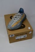 A pair of as new Adidas Yeezy Boost 350 V2 trainers (UK 5).