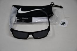 A pair of as new Nike Maverick RGE E sunglasses with protective pouch (RRP £137).