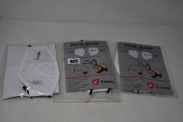 A large quantity of Ecolog reusable face masks in white.