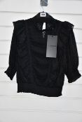 An as new The Kooples Dot smock top (Size 3 - RRP £178).
