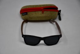 Five pairs of as new Woodies sunglasses.