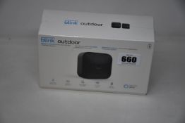 A boxed as new Blink Outdoor smart security camera system.