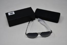 A pair of as new William Painter the Constellation sunglasses.