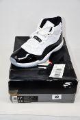 A pair of as new Nike Air Jordan 11 Retro Concord 2018 (UK 10.5).