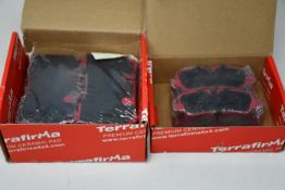 Two boxed as new Terrafirma Premium ceramic brake pad sets.