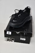 A pair of as new Nike MX-720-818 trainers in black (UK 6.5).
