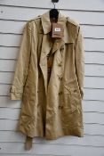 An as new Burberry The Chelsea trench coat with coat bag (UK 6 - RRP £1490).