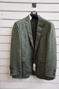 An as new Hackett London silk/wool blend jacket in green (42S - RRP £249).