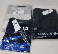 A pair of as new Lacoste sweatpants (FR 5), Lacoste T-shirt in grey (FR 4) and children's Lacoste