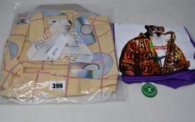 An as new Palace CD shirt (M) together with a Supreme Saxaphone T-shirt (L).