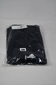 Four pairs of as new Adidas B47218 Essential training pants (1 x M, 1 x L, 2 x XL - RRP £35 each).