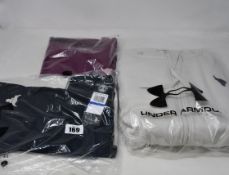 Three items of women's Under Armour Planet Rock clothing; ankle leggings (XL - RRP £55), T-shirt (XL