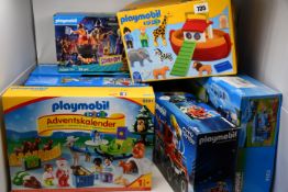 Seven as new Playmobil items to include Scooby Doo, water slide, caravan and fire truck.
