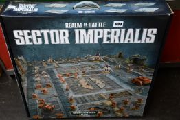 A boxed as new Warhammer 40,000 Realm of Battles: Sector Imperials board game.
