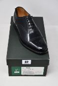 A pair of men's as new Loake 201B Semi-brogue shoes (UK 7.5F).