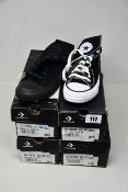 Four pairs of as new Converse All Star canvas shoes (UK 4, 2 x 5, 7).