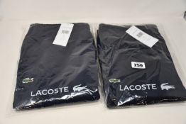 Two pairs of as new Lacoste sweatpants (FR 5).