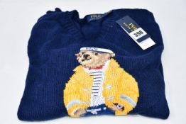 An as new Polo Ralph Lauren Yachting Bear crew knit navy sweater (L - RRP £240).
