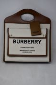 An as new Burberry medium two-tone Pocket bag (RRP £1,190).