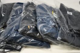 Five items of as new Under Armour sportswear; Storm SF 1/2 zip golf sweater (RRP £50), two pairs