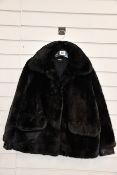 An as new The Kooples heavy rabbit and fake leather coat (Size 1 - RRP €455).