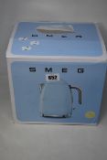 A boxed Smeg 1.7 capacity cream kettle (Box unsealed with cosmetic damage).