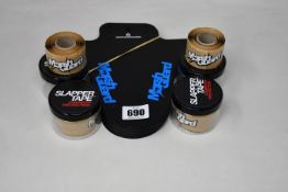 A box of assorted Marsh Guard Bicycle mud flaps and Slapper Tape.