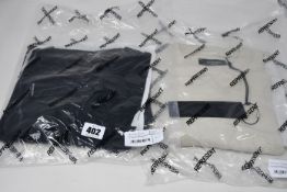 Two as new Represent Blank vintage T-shirts (1 x black, 1 x white, both L - RRP £70 each).