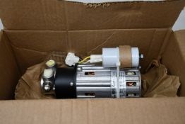 A boxed as new Wellbilt 020003095 motor and pump assembly (115/230V, 50/60Hz).