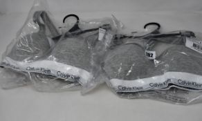 Four as new Calvin Klein Bralette Lift in grey (All S - RRP £40 each).