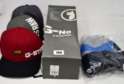 Three as new G-Star Raw baseball caps and a beanie hat together with a G-Star Raw G-No Bow Tie Rhino