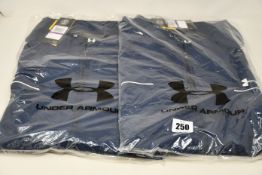Two as new Under Armour Storm Windstrike full zip tops (XXL - RRP £66 each).