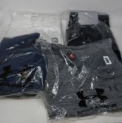 Four items of as new Under Armour sportswear; ColdGear Rival fleece hoodie (RRP £42), ColdGear Rival