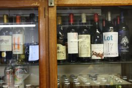A large quantity of miscellaneous wines and related items, approximately 25 bottles (Over 18s