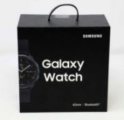 A boxed as new Samsung Galaxy Watch SM-R800 in Midnight Black UK Plug
