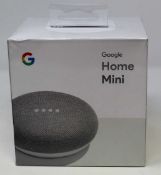 A boxed as new Google Home Mini Smart Speaker with Google Assistant in Chalk (Model: GA00210-US) (