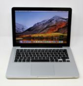 A pre-owned Apple MacBook Pro 13