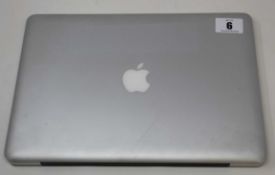 A pre-owned Apple MacBook Pro 13
